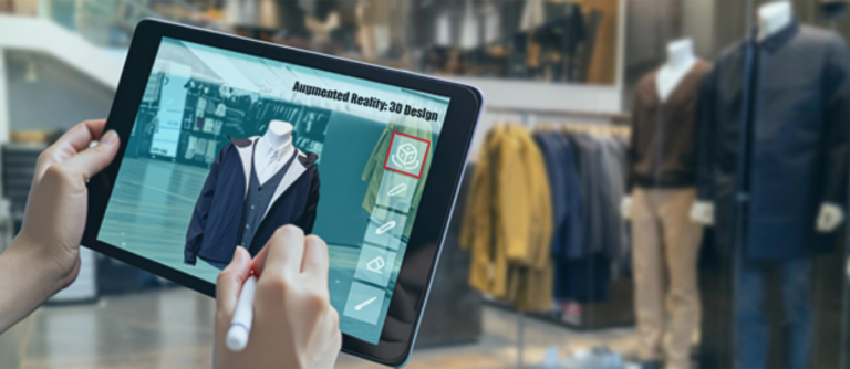 This is an image of a pair of Hands holding a tablet device and using an Augmented Reality app to edit a 3D design.
